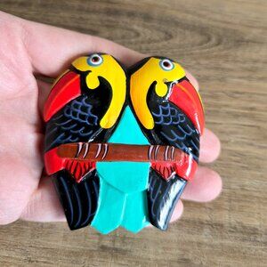 Large hand made hand painted wooden brooch with 2 parrots.